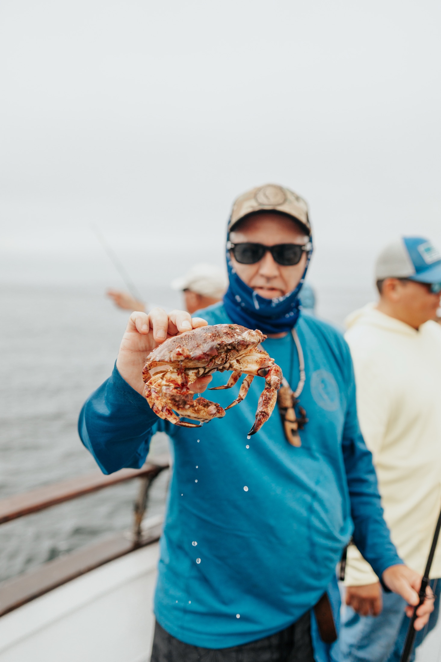 Angler presenting a fresh catch aboard the Eldorado