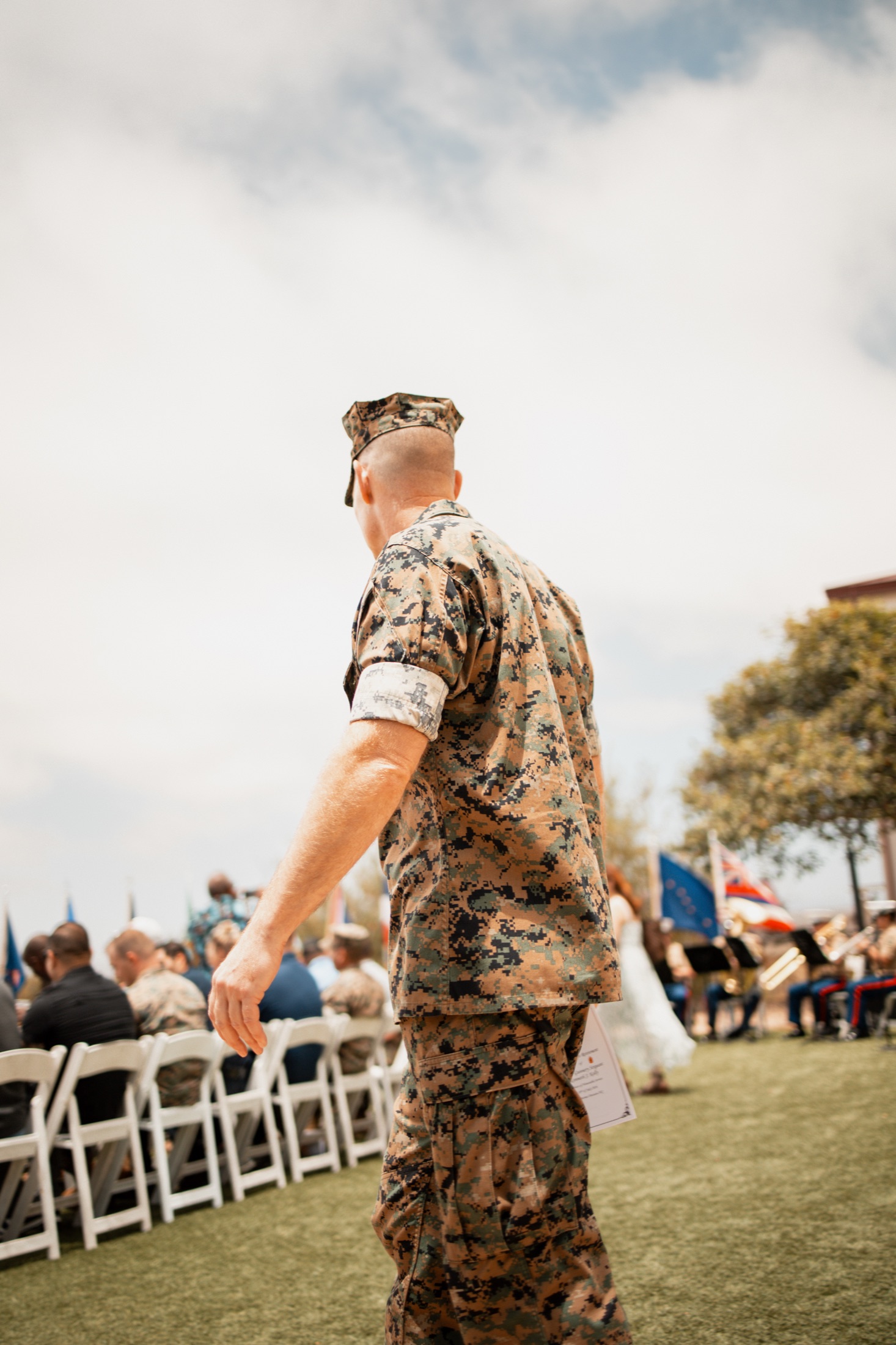 Marine standing at attention during the retirement ceremony