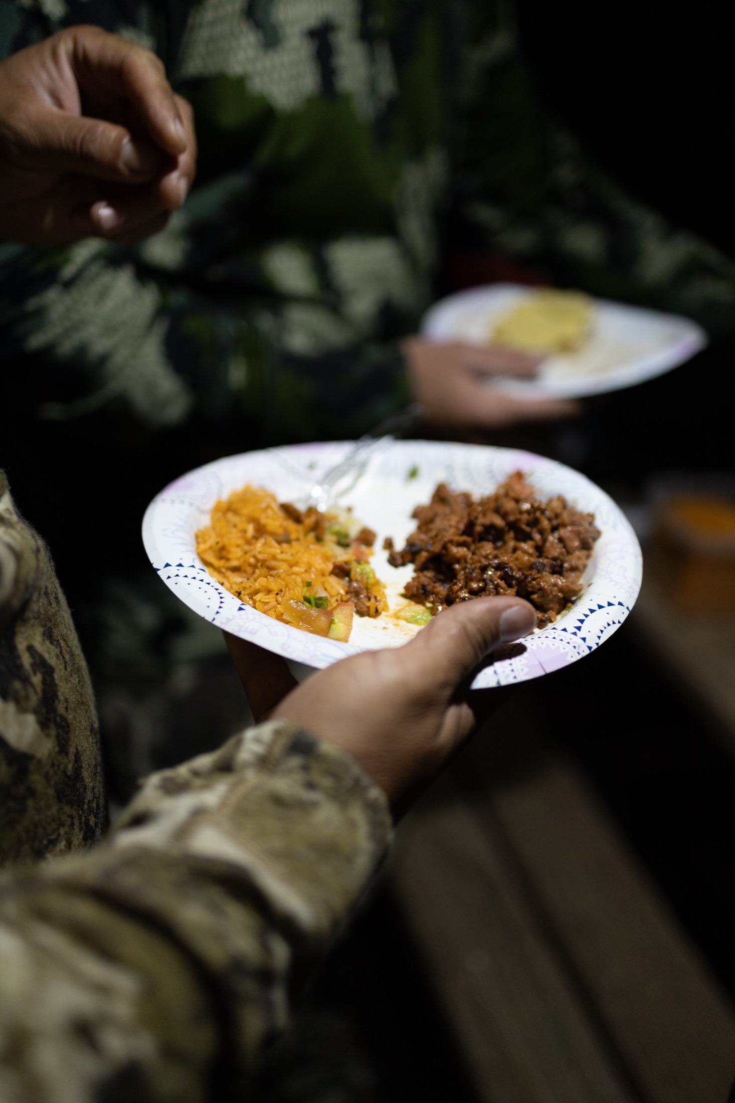 A camp meal being served in the field